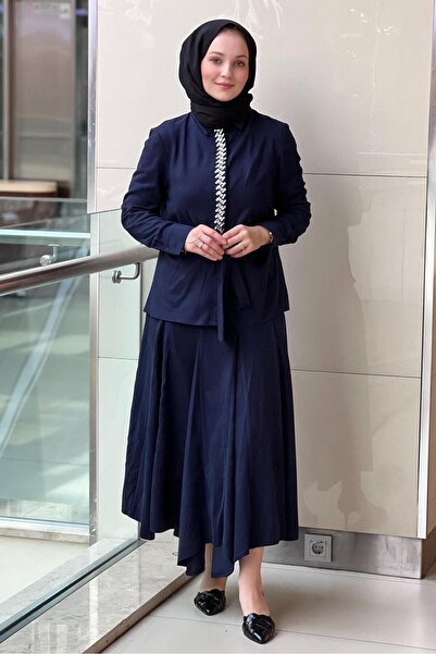 Ghisa Nubuck Shirt Skirt Set with Stone Embellished Tie Model on the Front