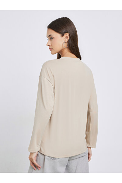 Styli Solid Front Pocket Oversize T-Shirt