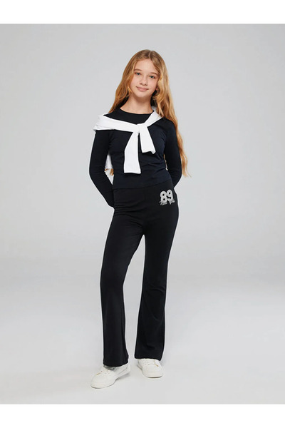 LC Waikiki LCW Kids Siyah New York Baskılı Ispanyol Paça Kız Çocuk Tayt