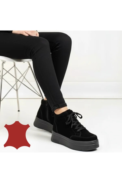 kevali Black leather ankle boots with stylized metal accessories SN5010