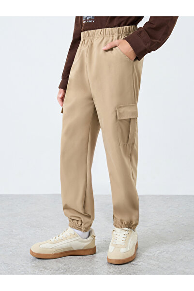 Styli بنطال رياضي سادة للأطفال باللون البيج