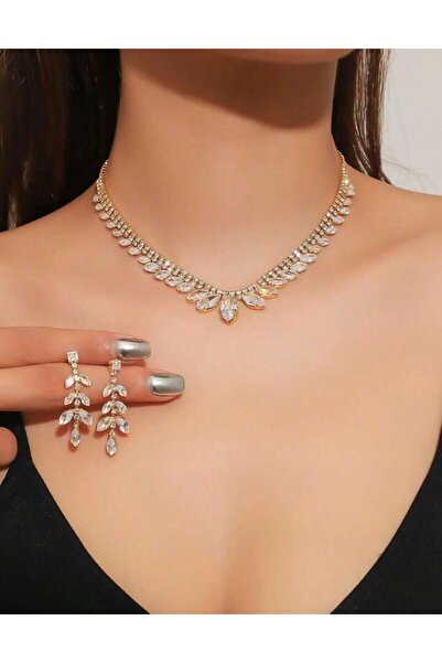 shopidik Pırıltılı Yaprak Detaylı Gold Renk Kolye ve Küpe Seti - Özel Davetle...