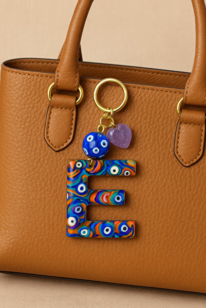 DKY سلسلة مفاتيح على شكل حرف E مع خرز على شكل عين الحسد لتزيين الحقائب