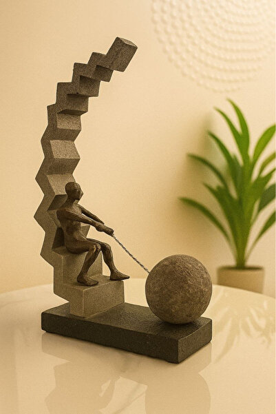 Oss elhetraf تحفة ديكور تجريدية بشكل رجل يدفع صخرة – تصميم فني حديث يرمز للإص...