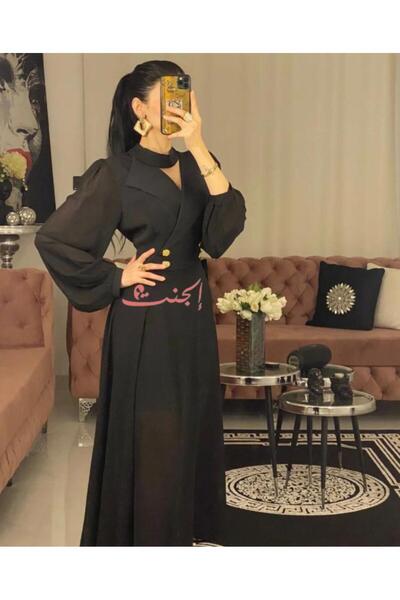 Elegent A sleek black dress with gold buttons and a classic cut - a luxurious design with a sophisticated touch.