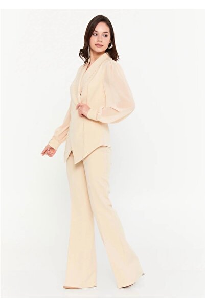 DEV LINE Nude Suit with Asymmetric Jacket and Puff Sleeves