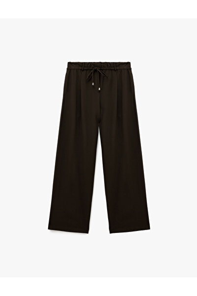 Koton Pantaloni din țesătură cu picioare largi, cu șireturi în talie și buzun...