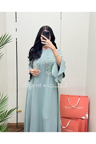 Elegent Soft jalabiya with ruffled sleeves and elegant embroidery ideal for evenings and special occasions.