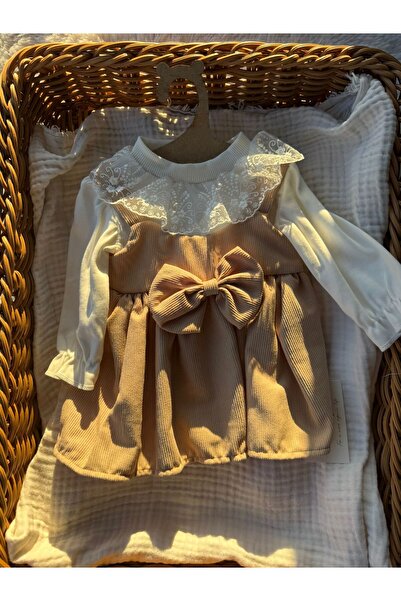SAHRA BABY FİYONKLU BEJ KADİFE BEBEK ELBİSE
