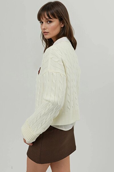 Hiccup Hair Braid Pattern Embroidered Sweater