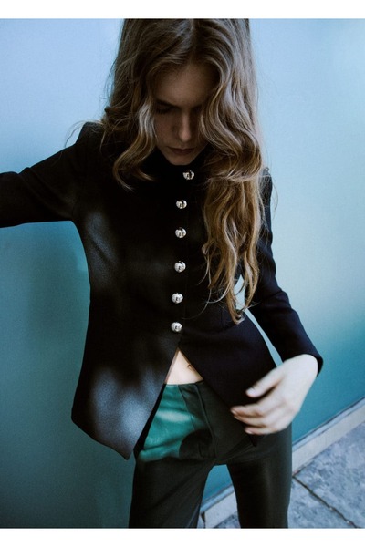 MANGO Woman Deri görünümlü flare pantolon