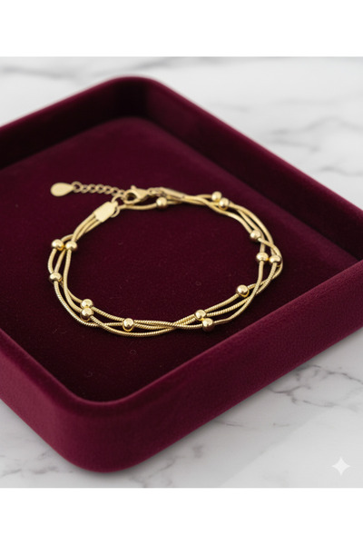 La Clarte Renk Atmaz Gold Çelik 3 Sıralı Dorika Kadın Bileklik – Şık ve Zarif Tasarım