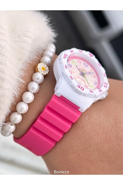 Q&Q Pink Silicone Corded 10 Bar Waterproof Girl's Wristwatch - Pool and Sea Use