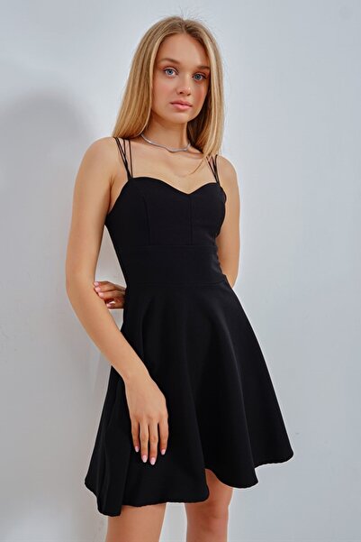 WOMAN VISION Schwarzes Minikleid aus Stretchmaterial mit gekreuzten Trägern i...