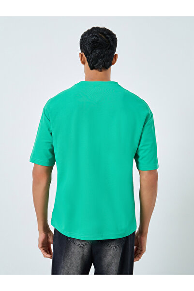 Styli Oversized Cut and Sew Detailing Graphic Printed T-Shirt