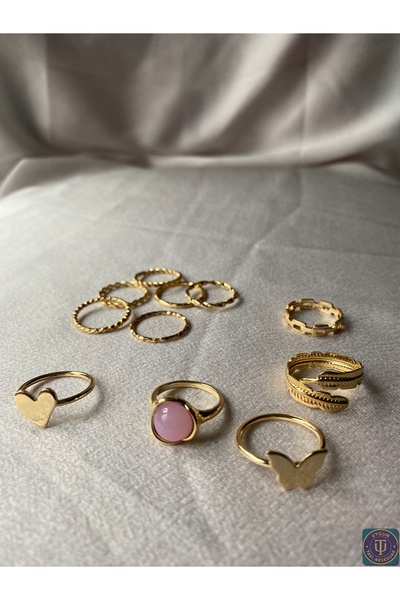 uyguntakıaksesuar طقم خواتم فولاذية ذهبية اللون مكون من 11 قطعة - مزين بتفاصي...