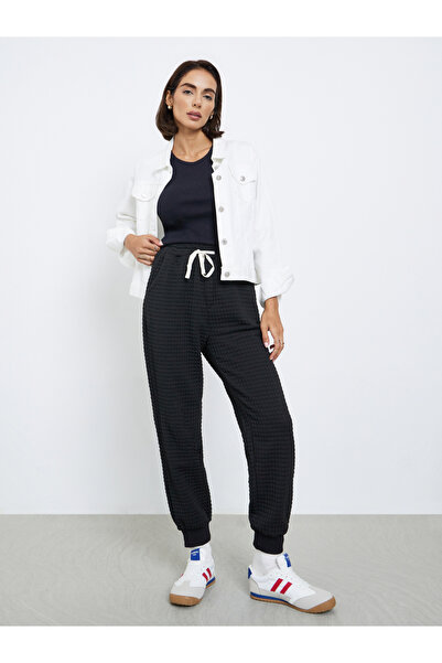 Styli Women Black Textured Loose Fit Cuffed Joggers