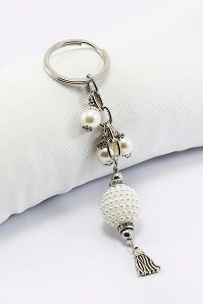 biuti Μεταλλικό μικρό μπρελόκ σε ασημί χρώμα με πέρλες και φούντες, διακοσμητ...