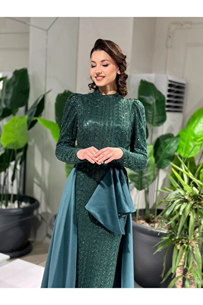 MERVE TESETTÜR فستان سهرة بتصميم عباءة