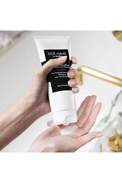 Sisley شامبو هير ريتويل للجنسين من ريفيتاليزينغ سيلنغ بزيت المكاديميا، 6.7 أونصة للعناية بالشعر