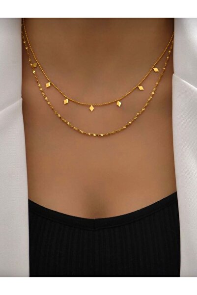 NEW STYLE A luxurious and modern accessory set consisting of a necklace and bracelet. The necklace measures 47 cm and is made of stainless steel. It comes in an elegant box.