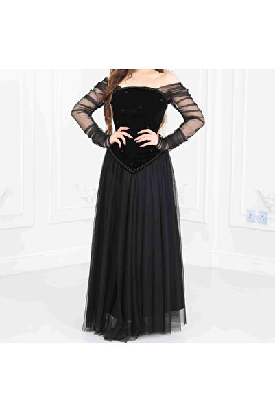 Nice Model A black velvet evening dress with sheer sleeves and an elegant corset design.