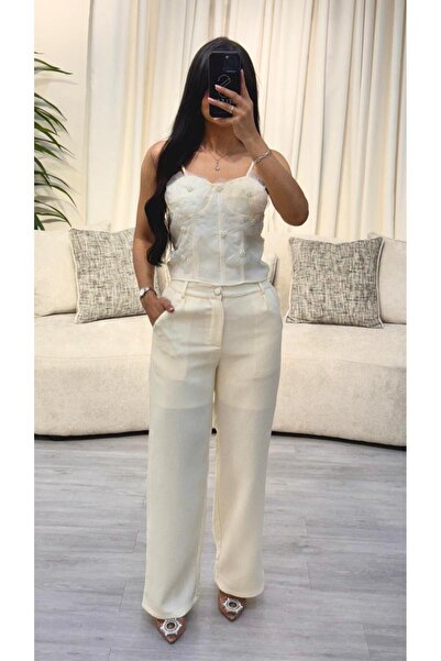 SELSAL Crossbody blouse embroidered with pearls and raised roses