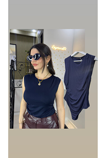 Butik Lacivert Bisiklet yaka çıtçıtlı body bluz kolsuz drapeli belden omuzdan...