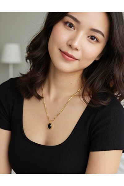 NEW STYLE A luxurious stainless steel accessory set consisting of a necklace and bracelet with black onyx pendants, presented in an elegant box.