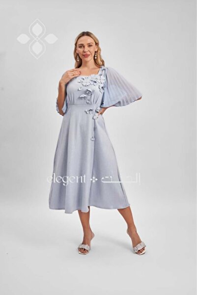 Elegent Sky blue dress adorned with 3D flowers and cape sleeves