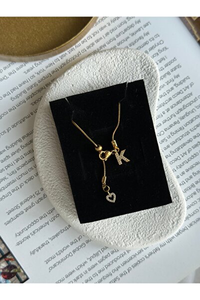 Rossetto Atelier قلادة لوسو على شكل حرف K من الفولاذ المقاوم للصدأ مع قلب