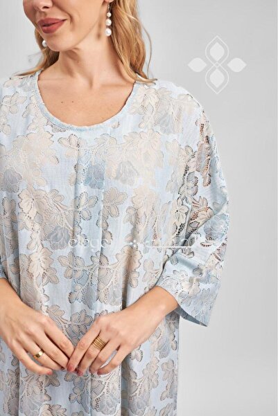 Elegent Sky blue lace jalabiya adorned with luxurious patterns