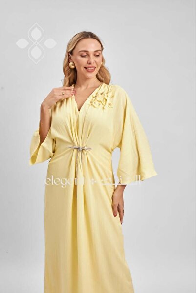 Elegent Yellow jalabiya with wide sleeves and floral detailing on the shoulder