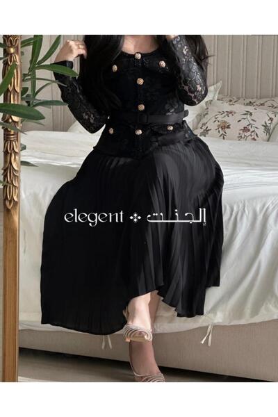 Elegent formal black dress with pleated lace, long sleeves, and gold buttons.