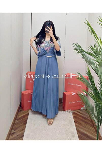 Elegent Sky blue dress embroidered with shimmering flowers and elegant pleated details - one size fits all