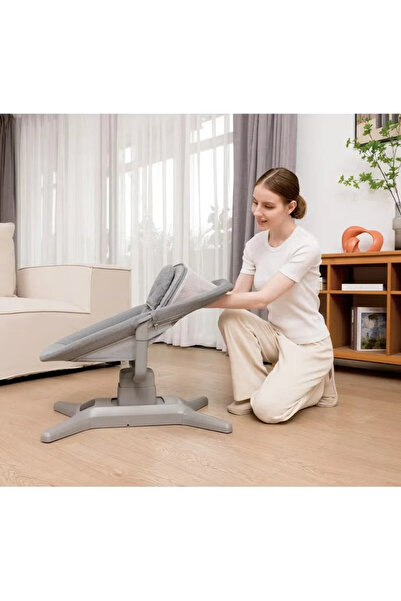 Mastela The latest Mastella 7-in-1 rocking bed with multiple positions, mobile connectivity, and rocking chair and bed design.