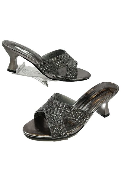 Btr Elegant and comfortable women's sandal heel with an X-shaped design and matching colored studs.