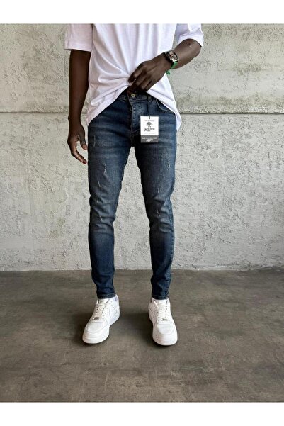 KağanKY Тъмносини дънки с измити и разкъсани детайли и тясна кройка