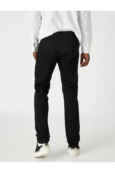 Koton Dżinsy z czarną kieszenią i szczegółowymi detalami
