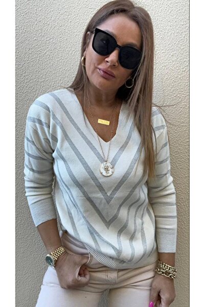 D LAVELLA بلوزة بفتحة رقبة على شكل حرف V مع تفاصيل خطوط لامعة