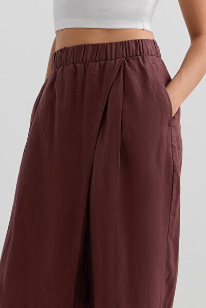 Oysho 100% linen wide straight-leg trousers with crossover front