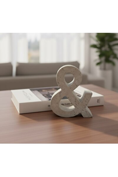 bity thok A decorative masterpiece in the 'And' design, made of white cement.