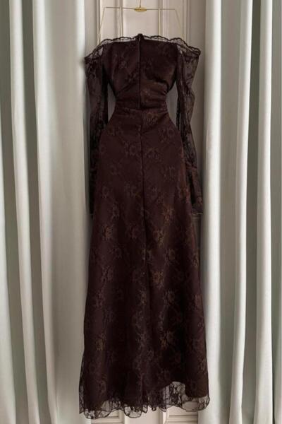 berlanty A long brown evening dress.