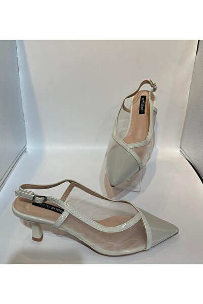 SOMERSET Women's shoes with an elegant transparent side heel and a shiny leather strap at the ends, with a choice of size.