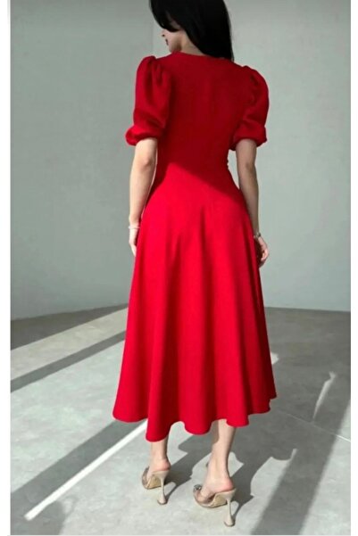 Narla Elegant midi dress with watermelon sleeves