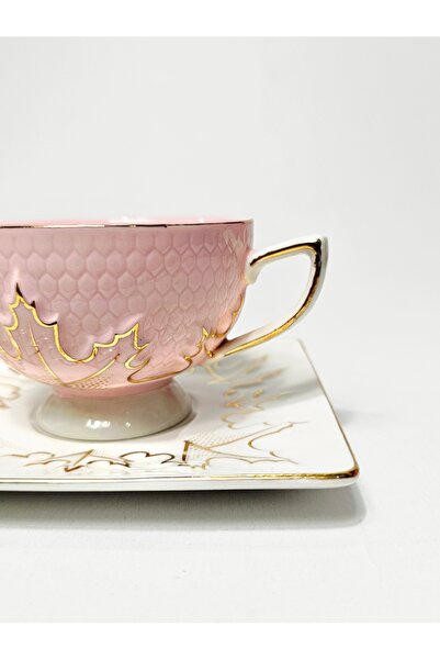 Casalina Ceramic cup and saucer set with floral-gold design
