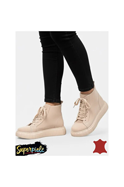 kevali Women's beige casual leather boots with laces and zipper.