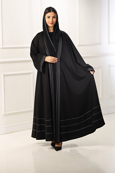 ZAHRA Black open-front abaya with a double-layered flared design, adorned with white woven lines made from internet fabric - a serene design with meticulous details.