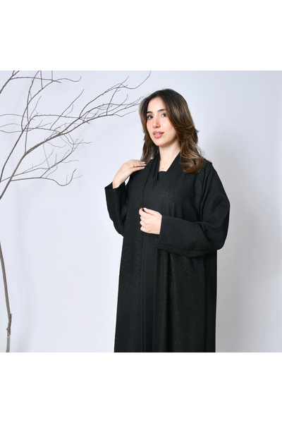 HAWRAA ABAYA عباية شتوية سوداء بسيطة راقية – تصميم عملي من عبايات حوراء