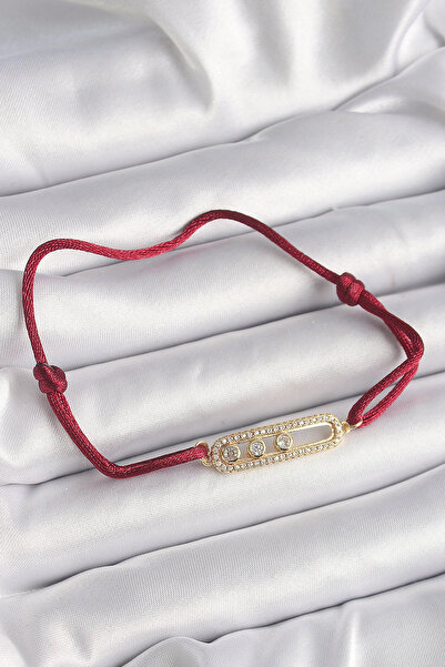 Clariss سوار نسائي من هارموني أورا بحبل أحمر وحجر الزركون الذهبي طراز ميسيكا